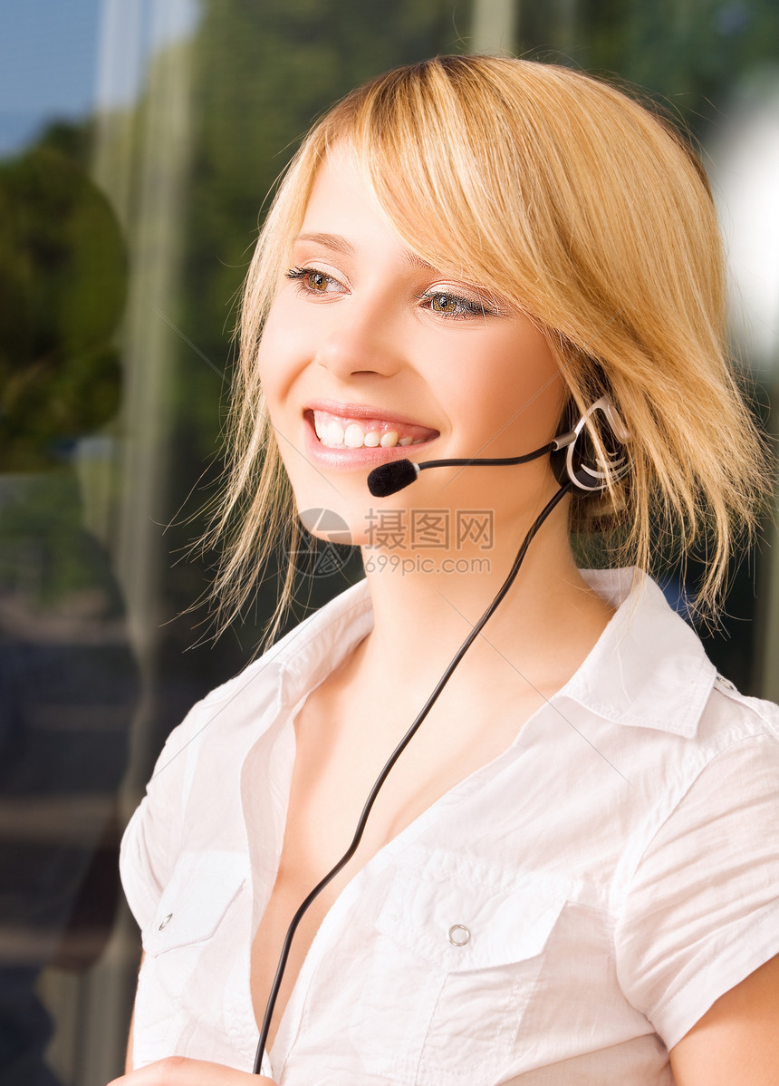 帮助热线中心商业求助顾问耳机技术女孩快乐微笑工人图片