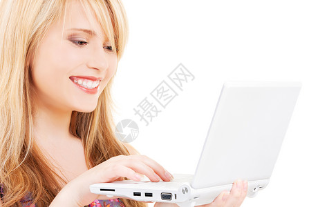 使用笔记本电脑的少女女郎教育互联网上网学生技术女性电子邮件金发青少年背景图片