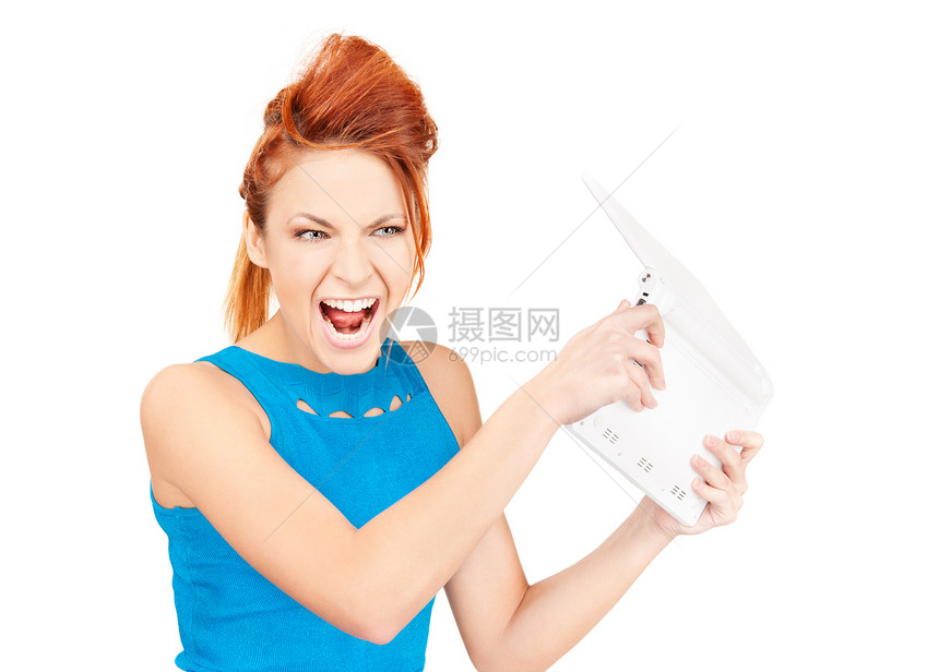 使用笔记本电脑的愤怒妇女女性白色戏剧性工作商业技术成人商务情感侮辱图片