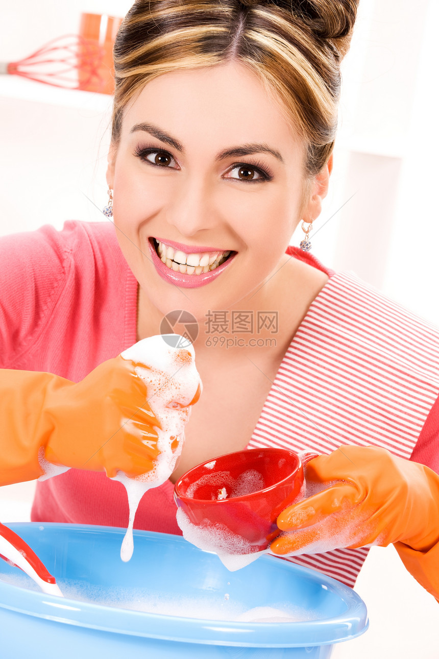 家庭主妇洗碗妻子女性泡沫家务手套桌子橡皮家庭主妇盘子橙子图片