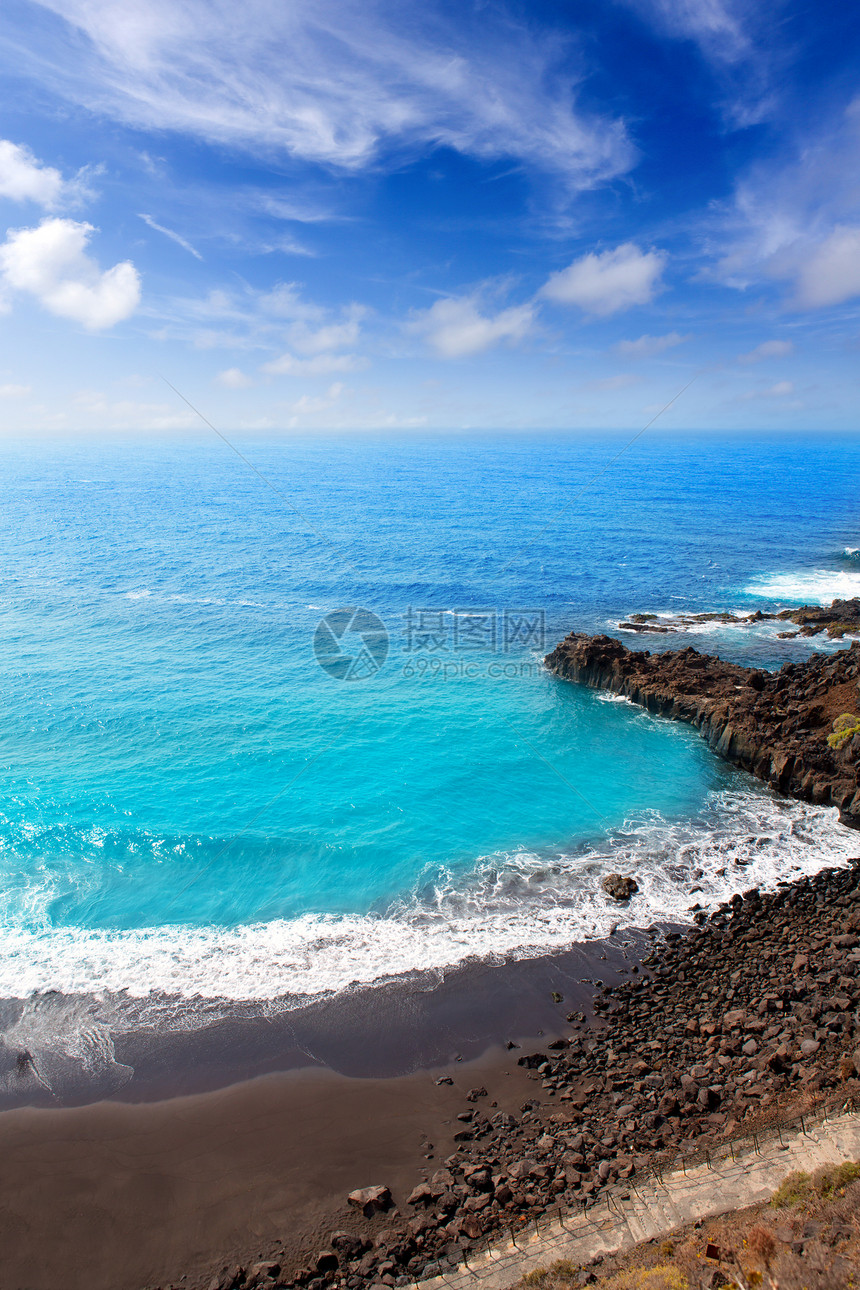 Bullullo海滩黑棕色沙和水异国火山海岸岩石情调天线岛屿支撑沙漠石头图片