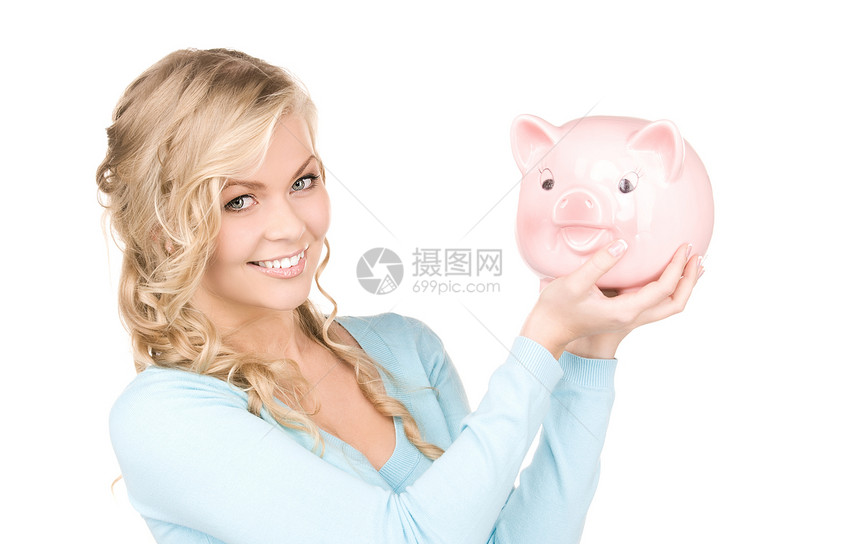 可爱的有小猪银行的女人快乐经济女孩金发女郎小猪微笑银行蓝色女性财政图片