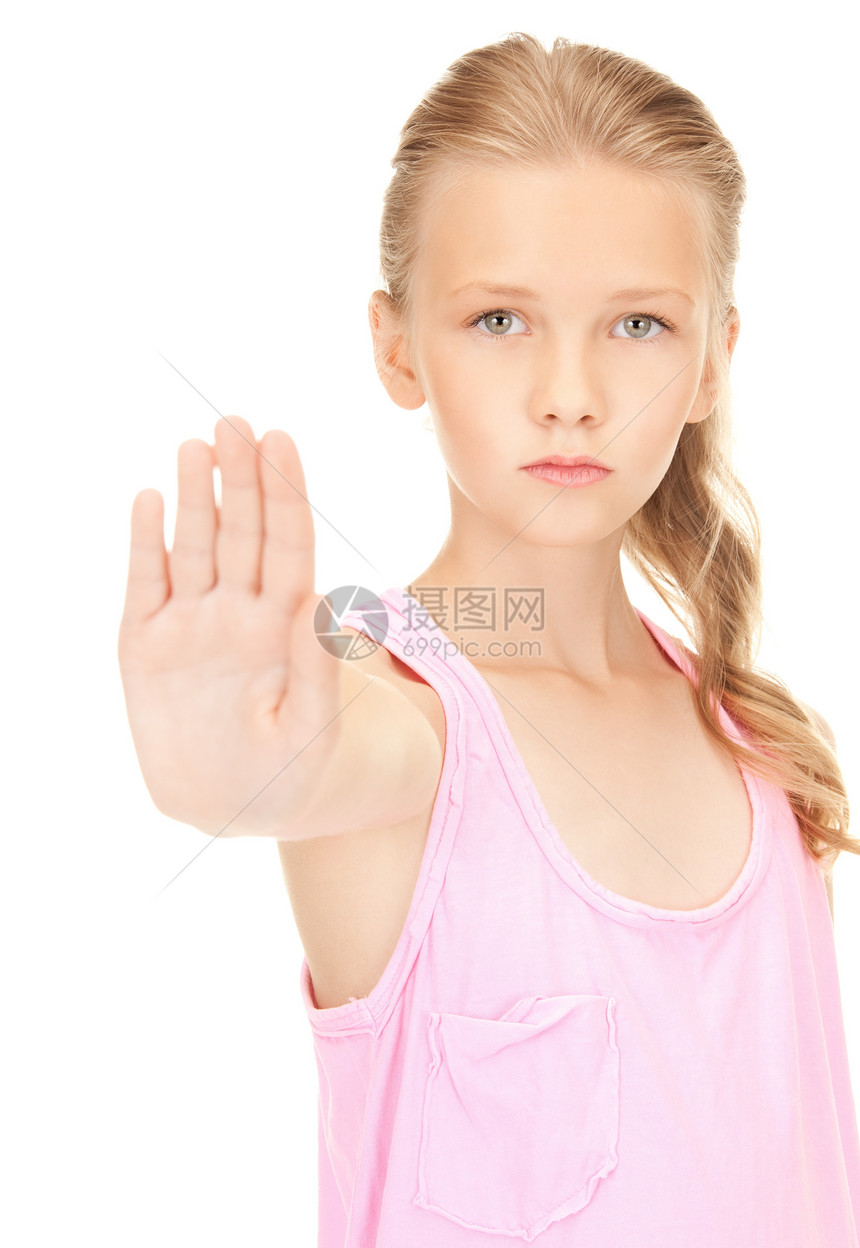 显示停车牌的可爱女孩抑制禁令衰退金发女郎青春期手势白色孩子警告学生图片