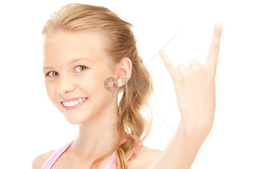 快乐的姑娘展示魔鬼角手势女性快乐手指金属岩石青春期牛角享受喜悦幸福图片