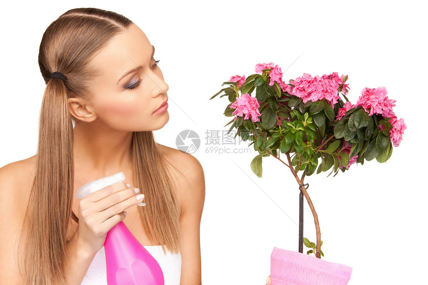 带鲜花的可爱家庭主妇花店女性活动园艺爱好花朵园丁生长成人植物图片