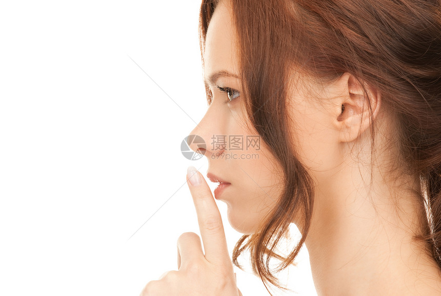 嘴唇上的手指女孩手势人士商务阴谋秘密女性警告黑发成人图片