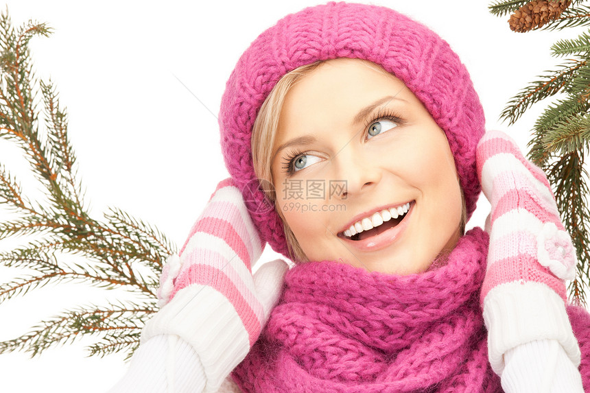 戴冬帽的美女快乐头发羊毛衣服手套微笑毛衣棉被福利季节图片