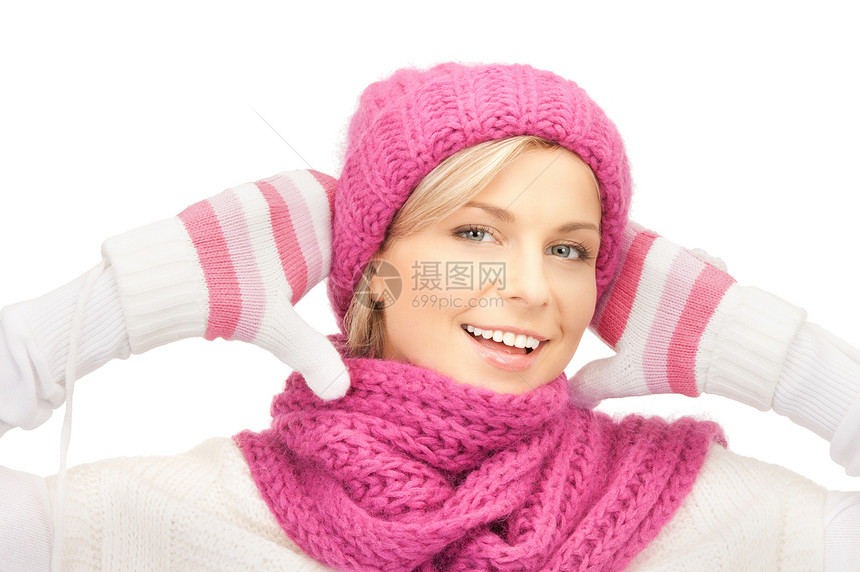 戴冬帽的美女羊毛手套棉被微笑成人衣服毛衣快乐帽子季节图片