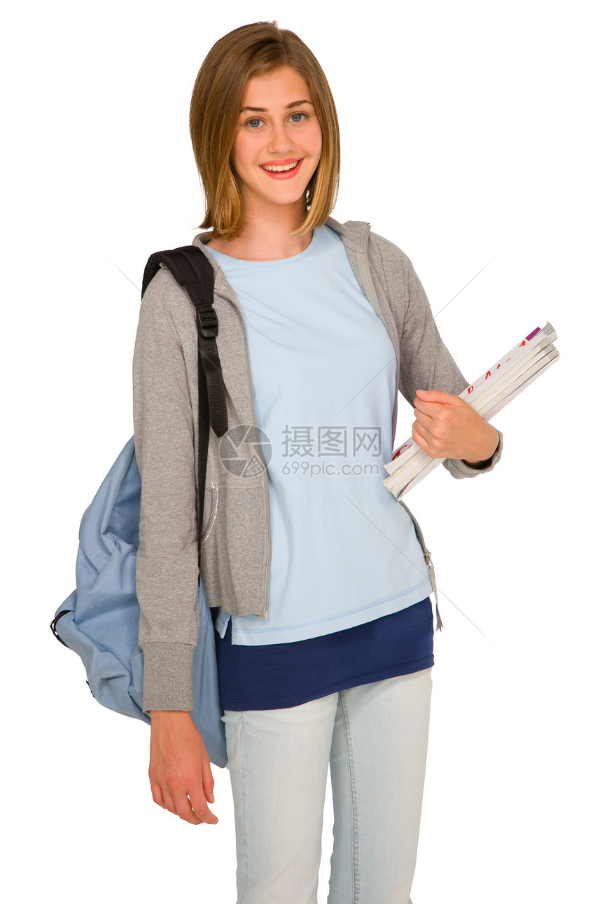 背包和书本的少女金发微笑牛仔裤青少年女孩金发女郎图书学生图片