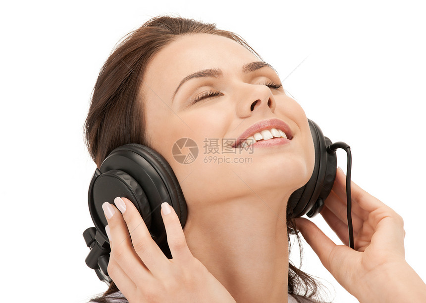 使用大耳机的快乐少女音乐播放器青少年听力闲暇音乐耳机享受手机幸福乐趣图片