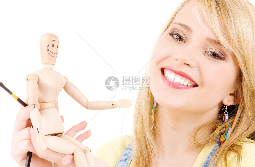 快乐的少女女孩与木模假木模特画家人体艺术家铅笔女性学生娃娃玩具微笑艺术图片