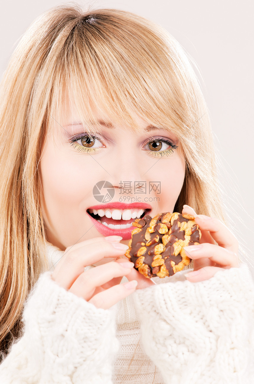 饼干乐趣巧克力金发女郎幸福甜点青少年女性饮食快乐女孩图片