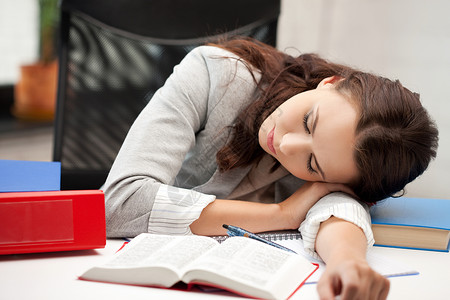 带书的睡妇女工人瞌睡大学睡眠眼睛员工学校学者学习商务背景图片