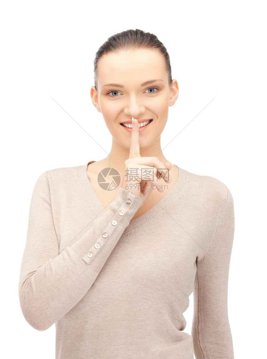 嘴唇上的手指成人生意人商务女孩女性秘密微笑人士手势警告图片