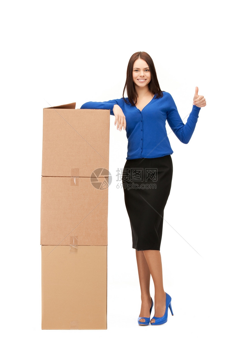 拥有大箱子的有吸引力的女商务人士命令集装箱船运纸板工人女性商业微笑销售量运输图片
