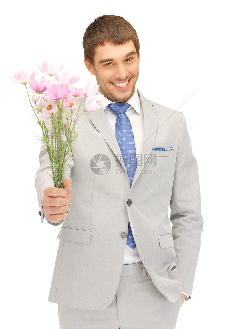 手拿着鲜花的帅帅帅男人男性花朵商务主义大男子丈夫惊喜礼物快乐套装图片