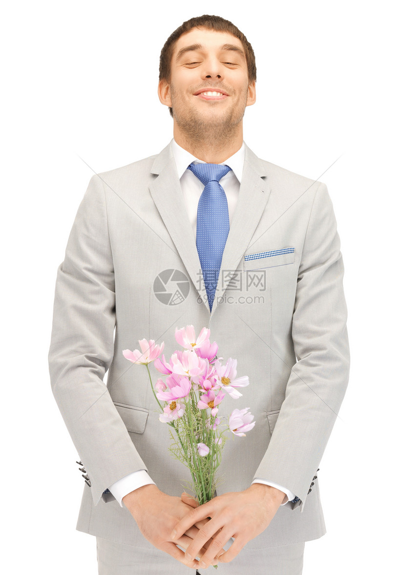 手拿着鲜花的帅帅帅男人套装微笑大男子男性花朵丈夫礼物人士皮士主义图片