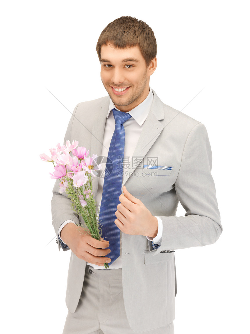 手拿着鲜花的帅帅帅男人生活大男子企业家商务礼物花朵庆典主义人士丈夫图片