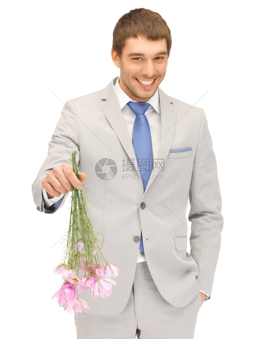 手拿着鲜花的帅帅帅男人丈夫套装人士工人商务企业家快乐皮士花朵庆典图片