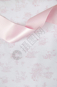 粉色带和纺织品细节蕾丝织物床单背景图片