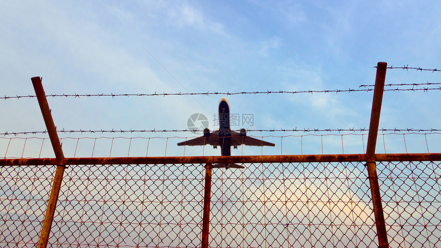 飞上飞机旅行天空车辆飞行运输网格航班空气蓝色边界图片