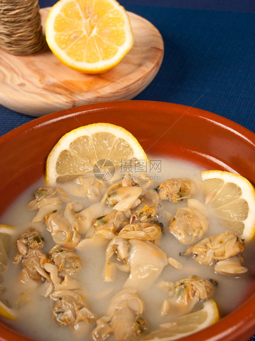 板状塔帕动物海鲜美食服务陶罐起动机柠檬果汁贝类图片
