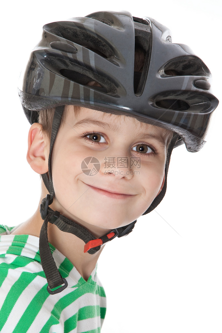 带头盔的男孩骑自行车运动员活动运动追求愿望微笑衣服工作室幸福男性成人图片