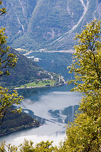 哈当厄峡湾照片来自挪威目的地蓝色瀑布天空荒野峡湾山脉旅游树木景观背景
