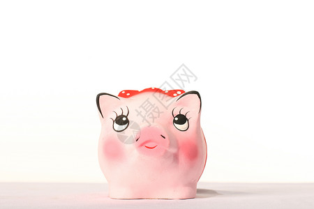 猪猪银行粉色储蓄小猪消费者现金背景图片