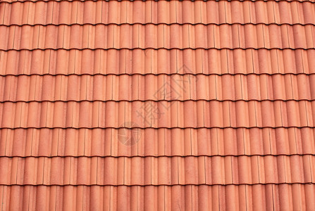 屋顶铺贴模式红色房子平铺橙子制品材料条纹陶瓷黏土棕色背景图片
