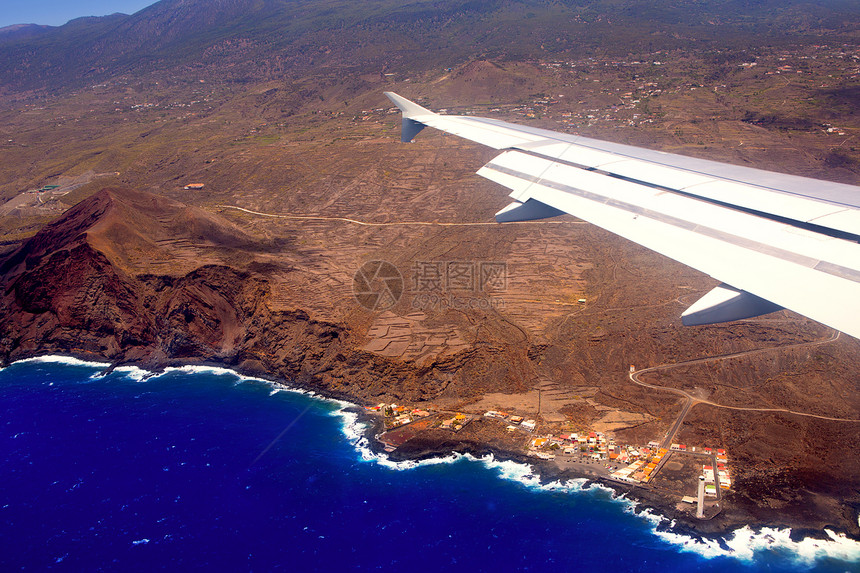 从La Palma飞机空中观察蓝色海岸气候运动土地天空天气海洋飞行火山图片