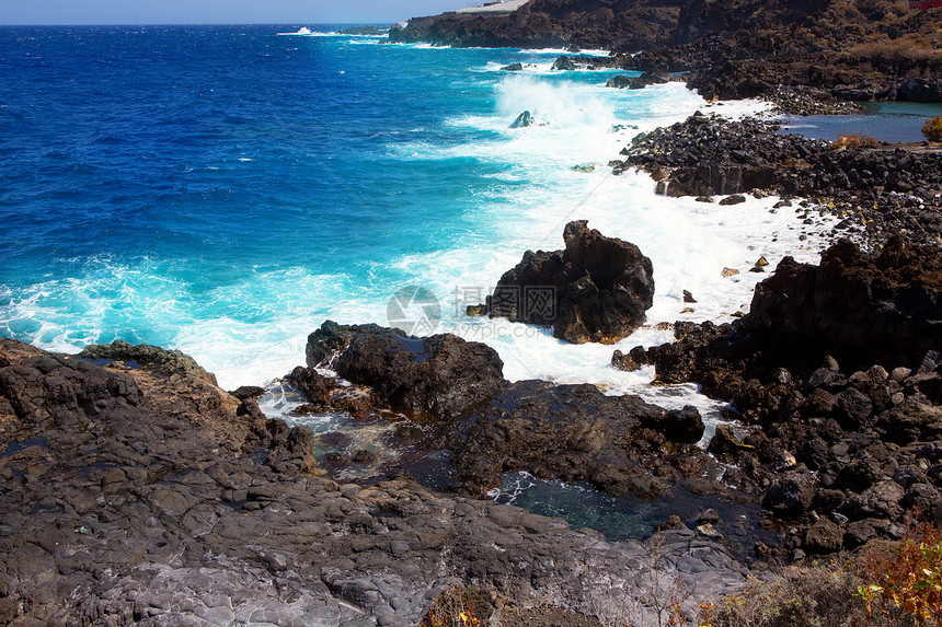 火山岩层海岸支撑地标情调蓝色晴天海景热带异国岛屿海洋图片