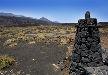 La Palma熔岩石栅栏柱岛屿栅栏干旱土地天空旅游火山旅行岩石沙漠背景图片