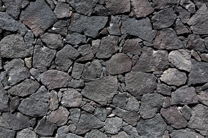 黑岩岩岩石火山泥瓦墙旅行土地假期岛屿岩石栅栏自然火山沙漠石头图片