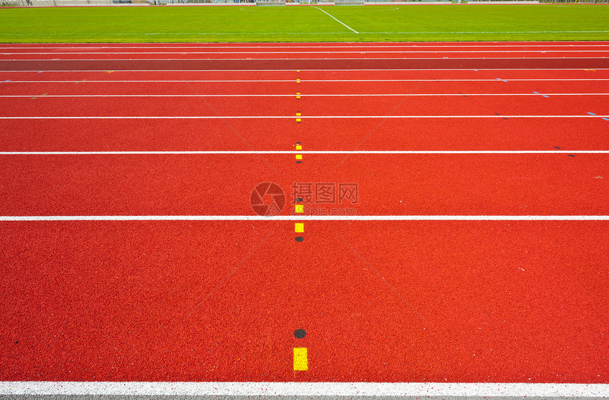 运行音轨绿色场地赛马场运动地面跑步体育场塑料车道红色图片