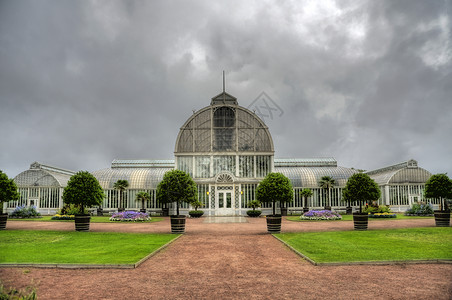 宫殿花园橙橙色热带亚时代建筑铸铁植物园建筑学种植温室植物学玻璃背景