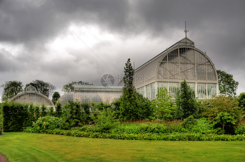 橙橙色绿色铸铁结构玻璃宫殿植物园建筑植物群花园温室图片