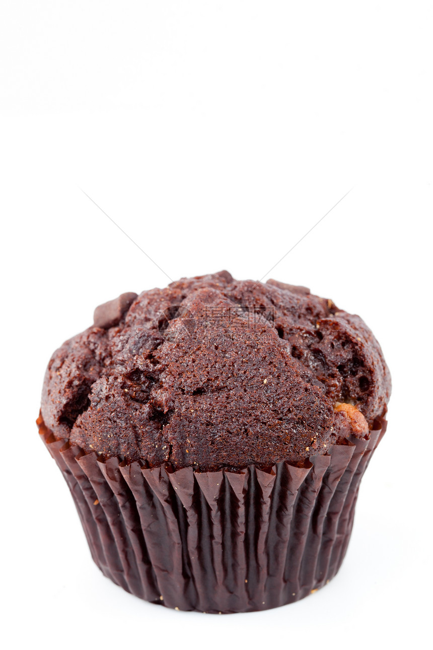 一个新鲜烤巧克力松饼的近身黑色食物棕色烹饪巧克力松饼甜点美食家蛋糕图片