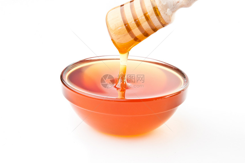 碗顶上的蜂蜜图片