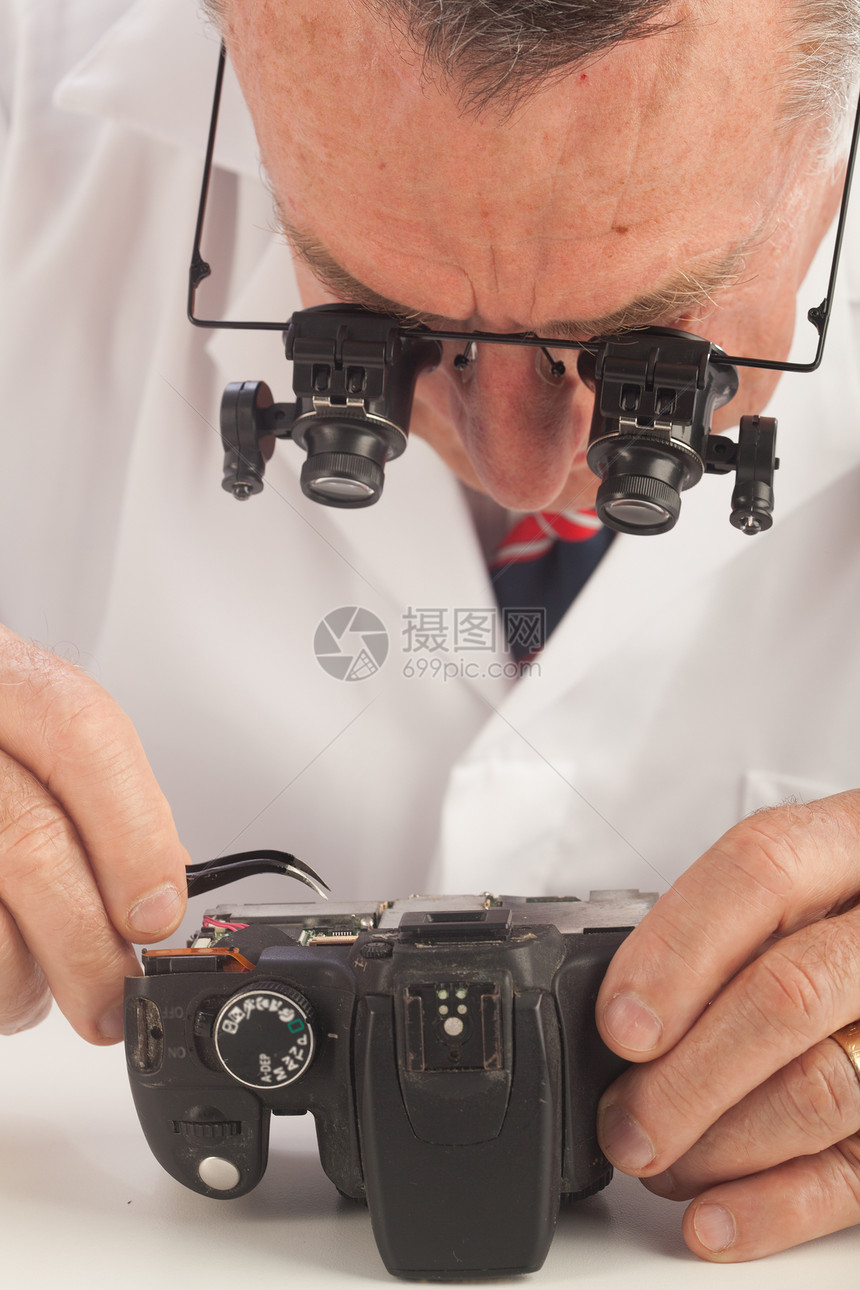 照相机修理员工作服维修放大镜镊子相机实验男性修理工电工图片