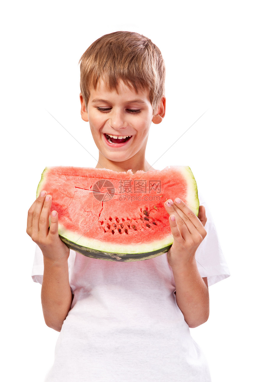 男孩在吃西瓜美食食物种子衣服水果小吃牙齿男生幸福微笑图片