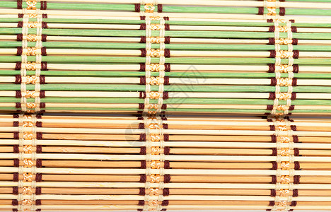 绿竹和黄竹马特宏观绿色绑定柳条木头餐垫装饰风格小地毯背景图片