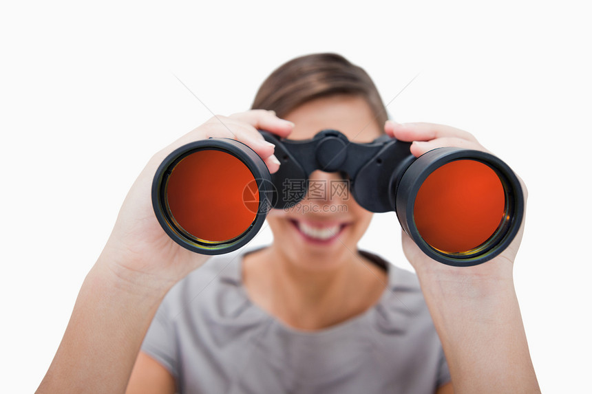 女人透过间谍眼镜看人士光学女性外表望远镜工作企业家手表经理商务图片