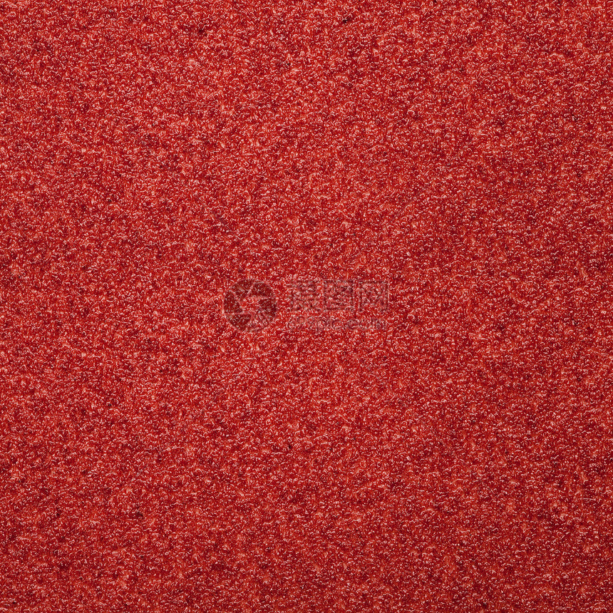 红色抽象背景正方形砂纸粒状颗粒状粮食材料宏观图片