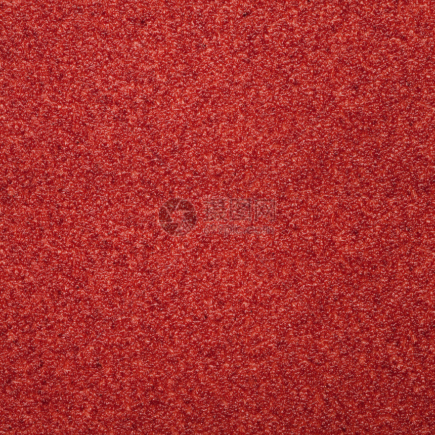 红色抽象背景颗粒状材料粒状砂纸粮食正方形宏观图片