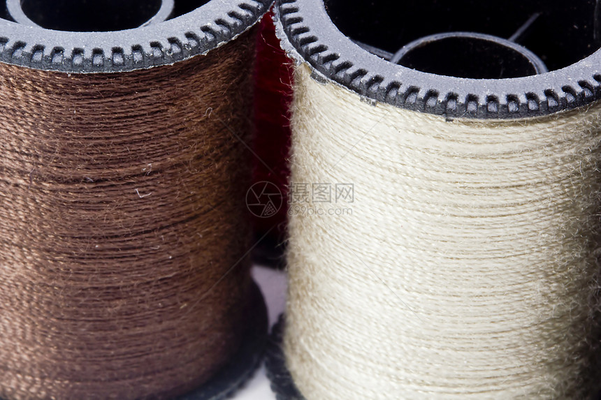线索的宏纺织品针织拼接工具刺绣衣服裁缝棕色材料纤维图片