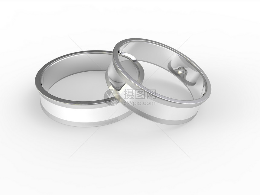 白色背景的金银婚戒和银银婚戒被孤立已婚反射订婚金子婚礼珠宝宏观婚姻庆典仪式图片