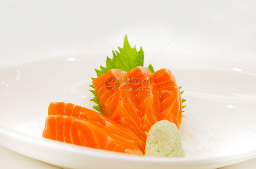 鲑鱼盘子香料美食拼盘寿司海鲜食物鱼片绿色白色图片