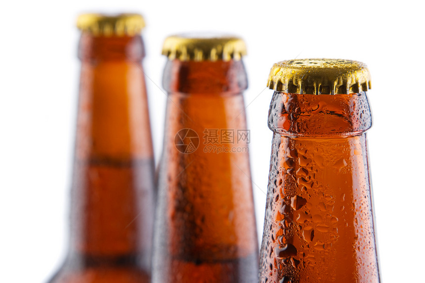 白底孤立于白底的啤酒瓶黄色饮料瓶子啤酒水滴啤酒厂棕色茶点草稿玻璃图片