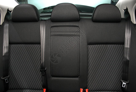 汽车后座乘客座椅安全座位安全带黑色纺织品腰带背景图片